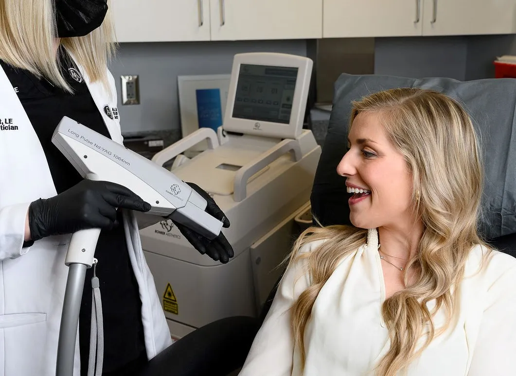 Patient learning about the Laser Leg Vein Removal machine