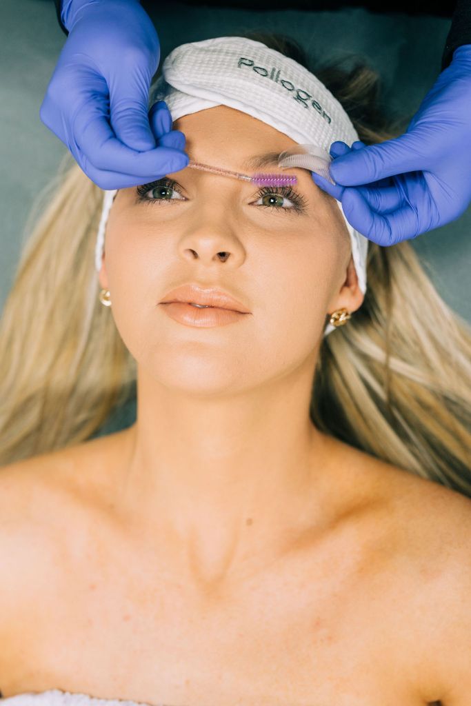 woman receiving eyelash treatment