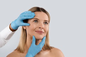 plastic surgery face lifting middle aged woman